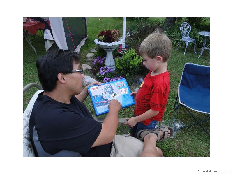 Mike and Marc with Marc's Gift at Christmas in July