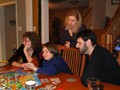 Melanie, Mason, Larissa and Andrew Playing Catan, Christmas