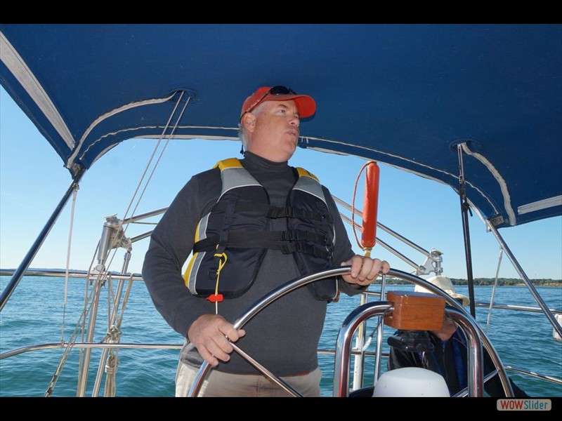 Sailing with Nick 08 - Nick at the Wheel