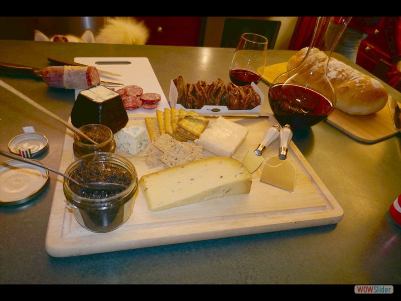 Sausage, Blue Cheese, Tartufata, Crackers, Cheese, Wine and Bread as Appetizers