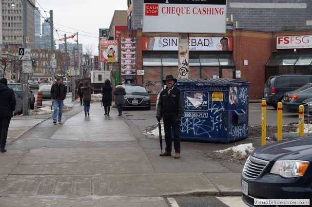 Corey with Graffiti in the Background at the Kensington Market