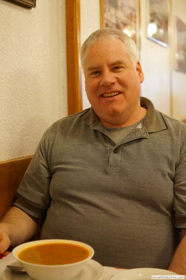 Nick Having Pea Soup in Country Style Hungarian Restaurant