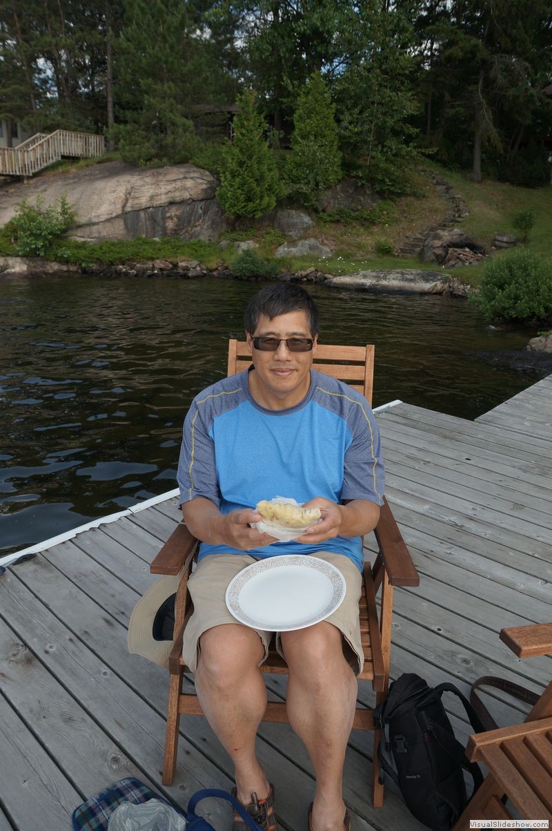 Mike Eating Roti on Dock