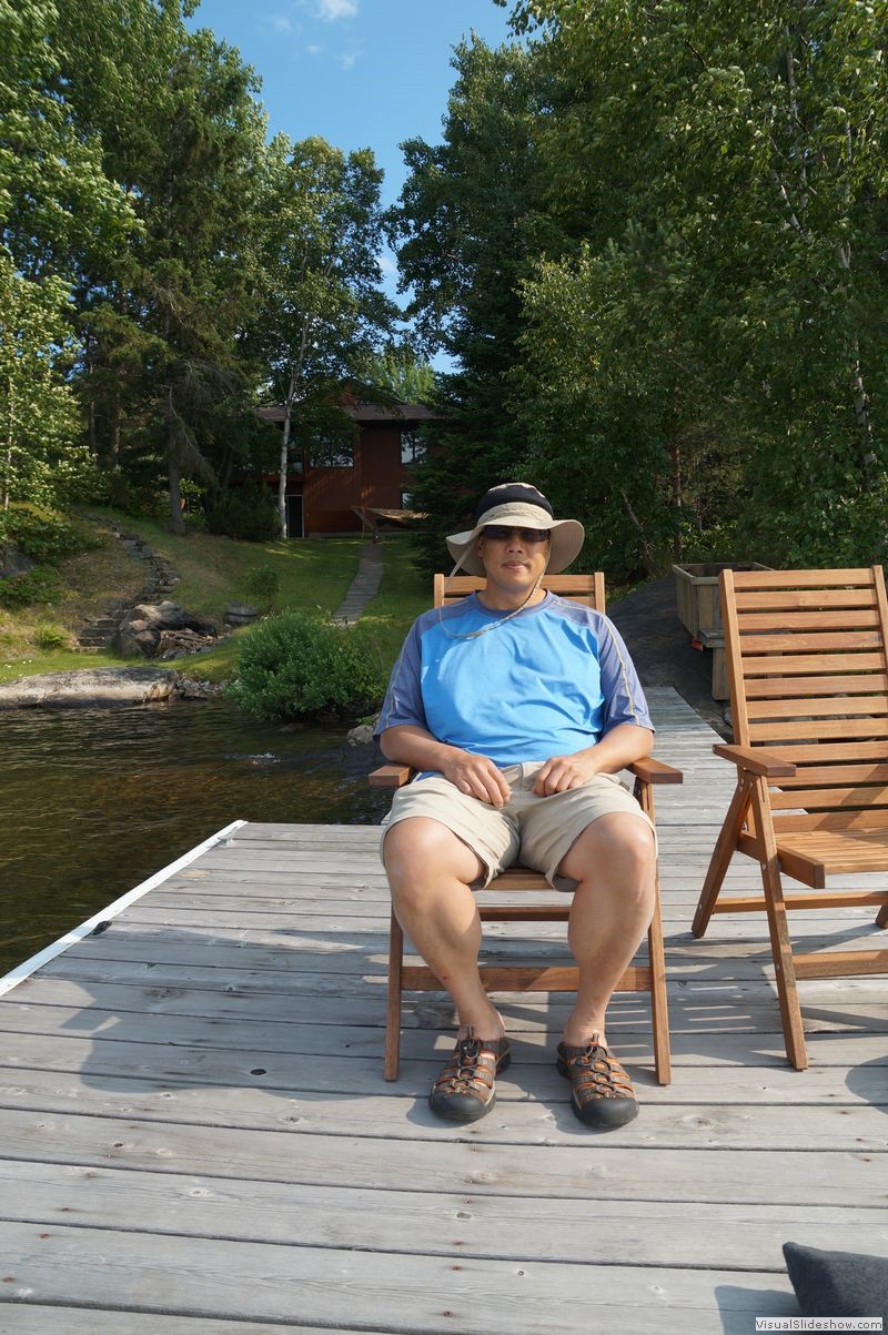 Mike Sitting on Dock