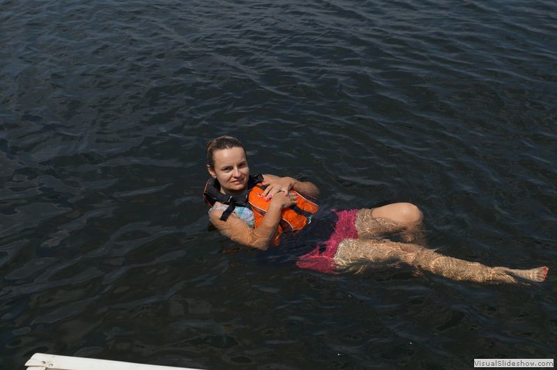 Rhonda Swimming by Dock