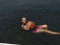 Rhonda Swimming by Dock